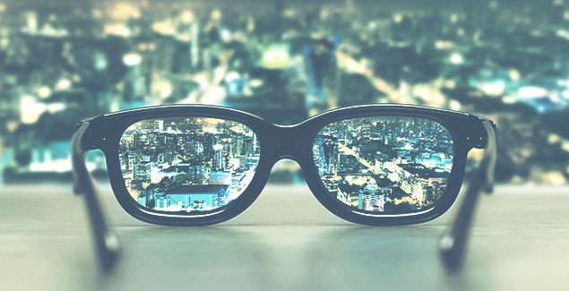 a pair of spectacles overlooking a city scape